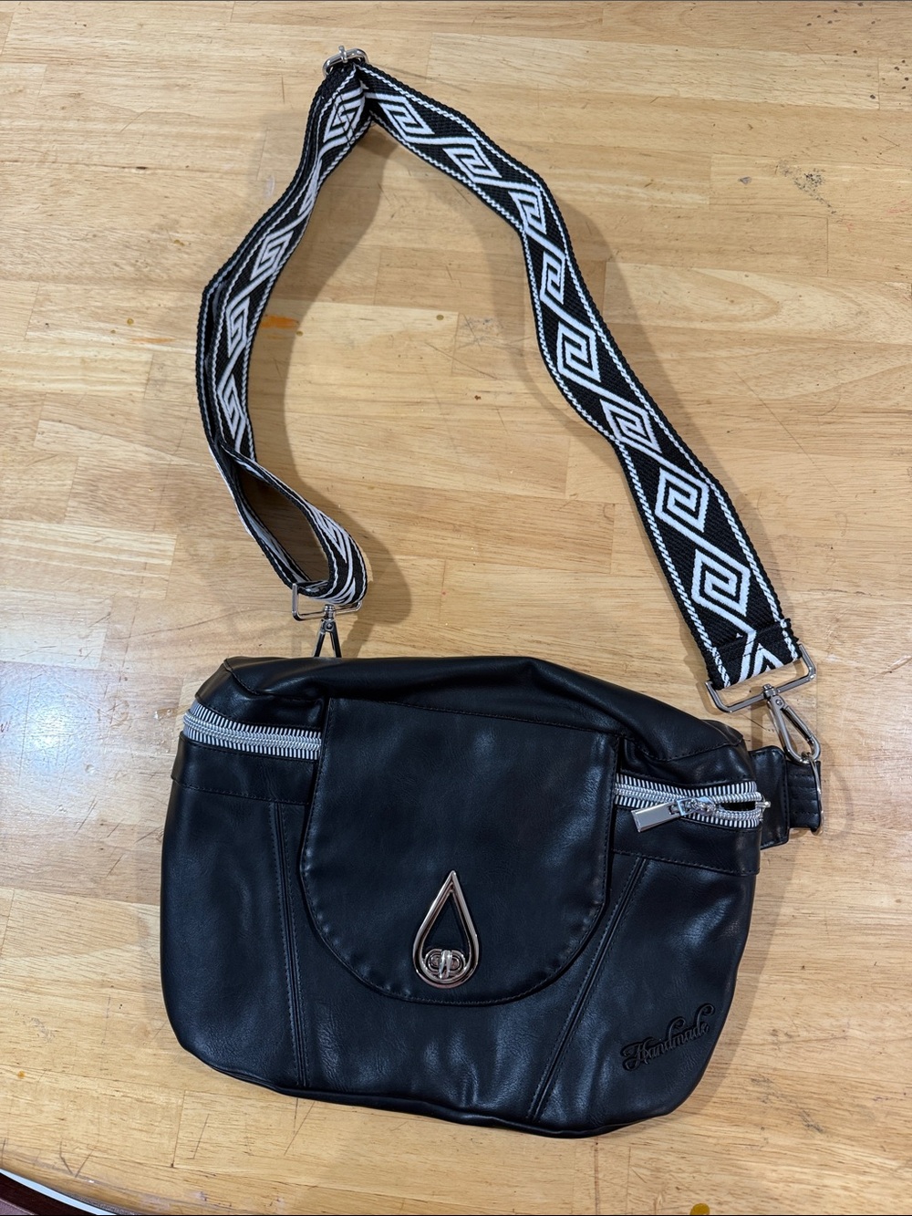 Black Crossbody Bag with Patterned Strap